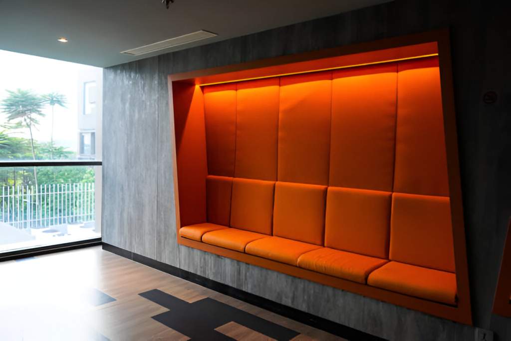 The Role of Acoustic Upholstery in Semi-Enclosed Booths: Material Choices That Balance Sound Control and Aesthetic Appeal