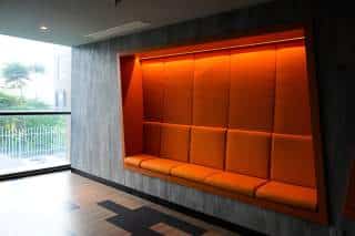 The Role of Acoustic Upholstery in Semi-Enclosed Booths: Material Choices That Balance Sound Control and Aesthetic Appeal